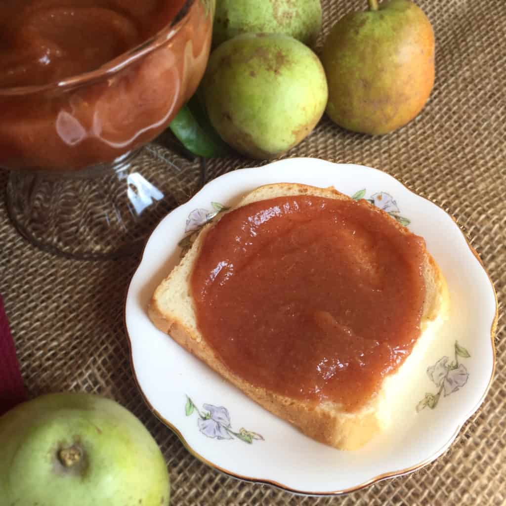 Pear butter spread on a piece of bread