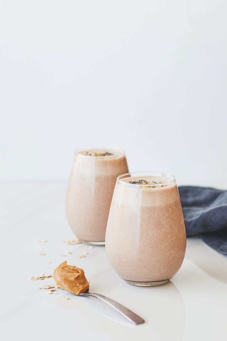 peanut smoothie on stylish glasses  Photo by Leah Rolando on Pexels.com