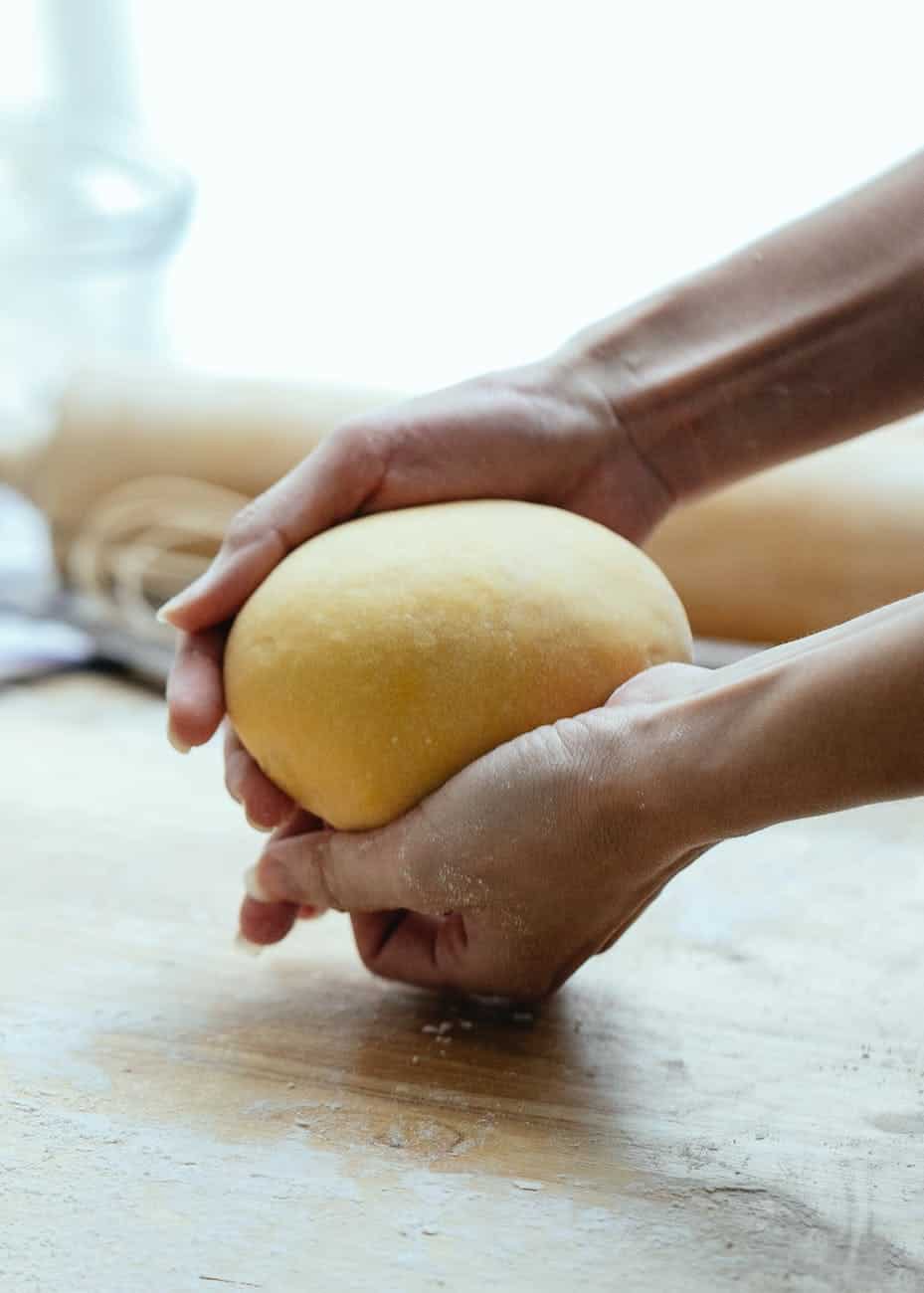 crop cook with raw dough
Photo by Katerina Holmes on Pexels.com