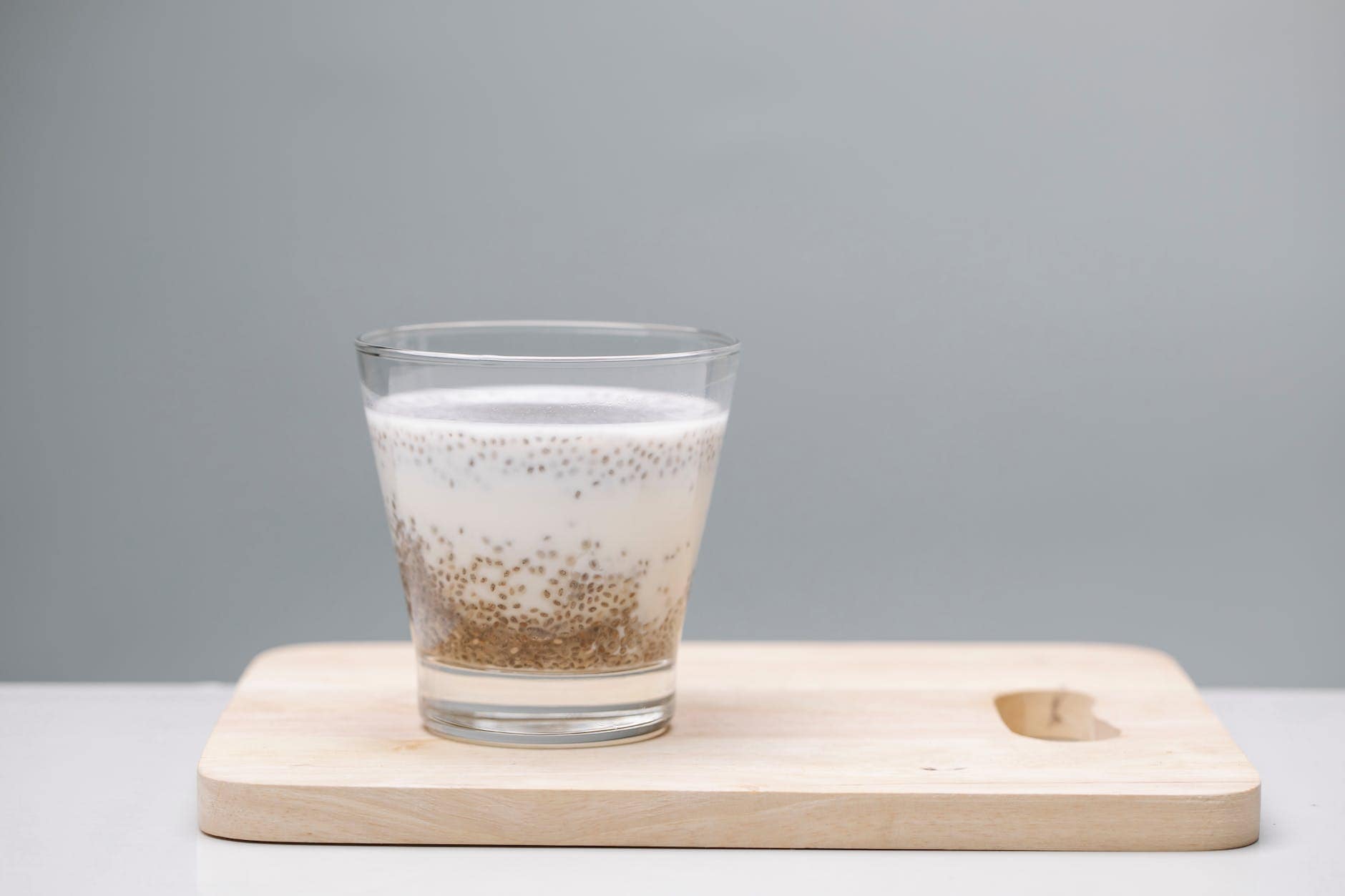 glass of tasty pudding with chia seeds